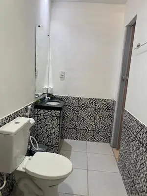 Uma casa de banho em Suítes Nativa