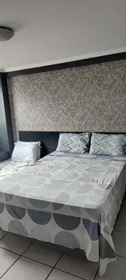 Uma cama ou camas num quarto em Porto de iracema