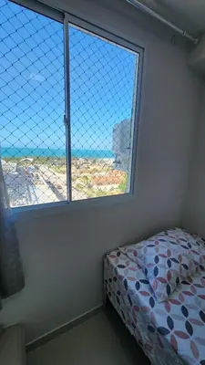 Uma cama ou camas num quarto em Mirante Clube - Praia do Futuro