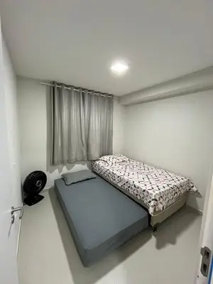 Uma cama ou camas num quarto em Mirante Clube - Praia do Futuro