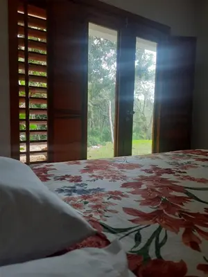 Uma cama ou camas num quarto em Paraíso no coração de Guaramiranga