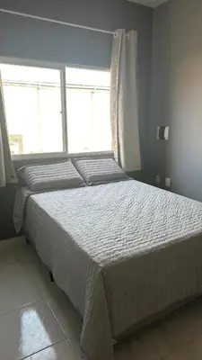 Uma cama ou camas num quarto em Pousada Avenida Beberibe