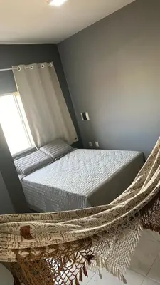Uma cama ou camas num quarto em Pousada Avenida Beberibe