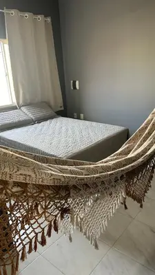 Uma cama ou camas num quarto em Pousada Avenida Beberibe