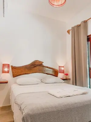 Uma cama ou camas num quarto em Uba Village Icaraizinho