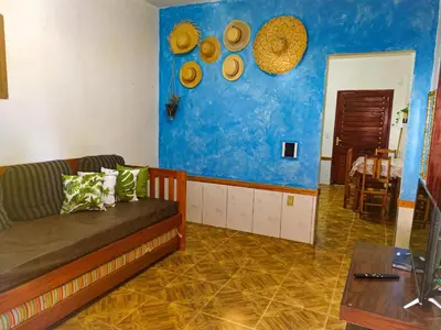 Uma área de estar em Casa Rumaré