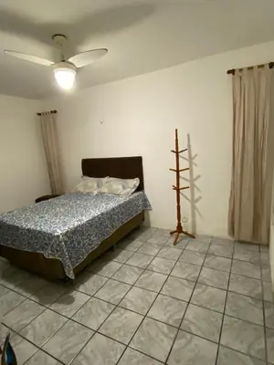 Uma cama ou camas num quarto em Apto Temporada praia do futuro Fortaleza CE