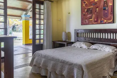 Uma cama ou camas num quarto em Casa de Praia com Piscina - Guajiru - Flecheiras