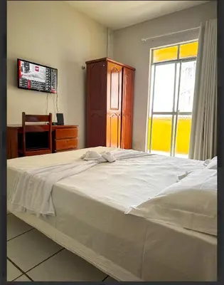 Uma cama ou camas num quarto em Hotel e Flat Sobral Mundi
