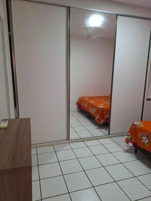 Uma cama ou camas num quarto em Apartamento para temporada Beira Mar
