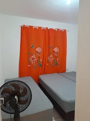 Uma cama ou camas num quarto em Apartamento para temporada Beira Mar