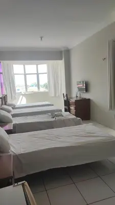 Uma cama ou camas num quarto em Hotel e Flat Sobral Mundi
