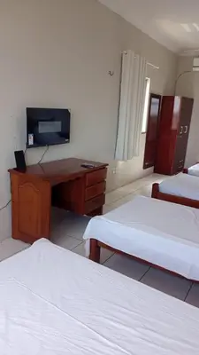 Uma cama ou camas num quarto em Hotel e Flat Sobral Mundi
