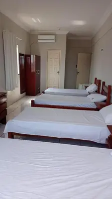 Uma cama ou camas num quarto em Hotel e Flat Sobral Mundi