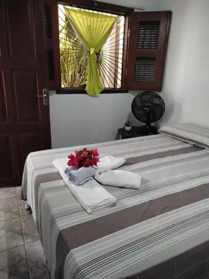 Uma cama ou camas num quarto em Residencial dos Freitas