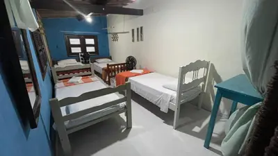 Uma cama ou camas num quarto em Residencial dos Freitas