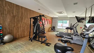 O centro de fitness e/ou as comodidades de fitness de KQ 64 - Beira-Mar com Estilo Apê 2 Quartos Aconchegante em Fortaleza