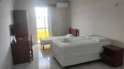 Uma cama ou camas num quarto em Hotel e Flat Sobral Mundi