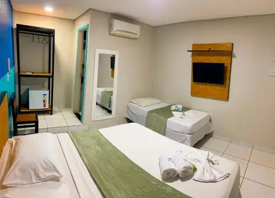 Uma cama ou camas num quarto em Pousada Vila Mansa Jeri