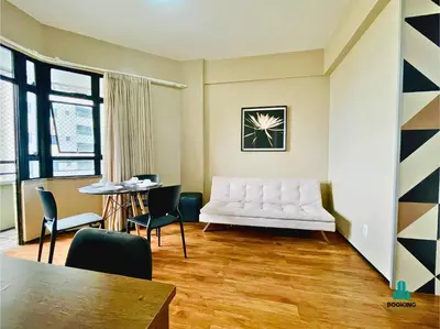 Uma área de estar em Golden Flats Beira Mar by Holiday Stays