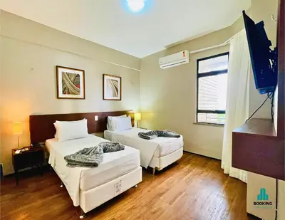 Uma cama ou camas num quarto em Golden Flats Beira Mar by Holiday Stays