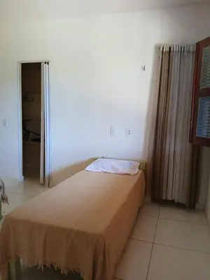 Uma cama ou camas num quarto em Cantinho do sossego