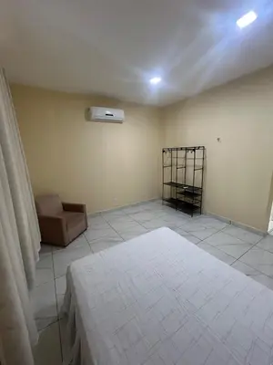 Uma cama ou camas num quarto em casa de praia oasis beach