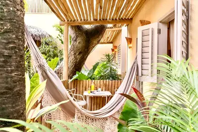 Um jardim no exterior de Pousada Vina