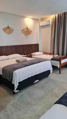 Uma cama ou camas num quarto em Home Preá- 2 min from the beach- with pool