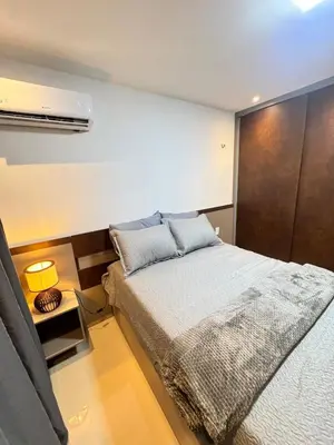Uma cama ou camas num quarto em Melhor AP em Sobral de frente ao Shopping