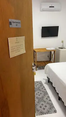 Uma cama ou camas num quarto em Pousada Zoom Jericoacoara