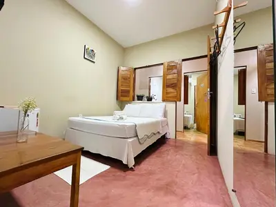 Uma cama ou camas num quarto em Pousada Zoom Jericoacoara