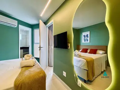 Uma cama ou camas num quarto em Aquarius Style by Holiday Stays