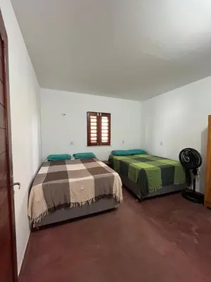 Uma cama ou camas num quarto em Casa da Fran