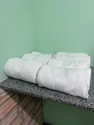 Uma cama ou camas num quarto em Casa de praia Porto Das Dunas