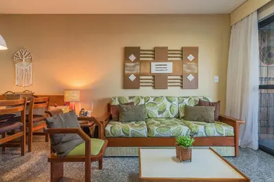 Uma área de estar em Iracema Residence #103 - Beira Mar by Carpediem