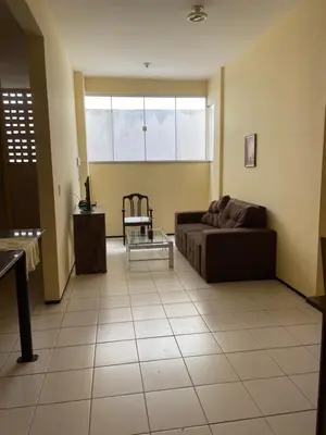 Uma área de estar em Apartamento completo