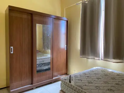 Uma cama ou camas num quarto em Apartamento completo