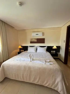 Uma cama ou camas num quarto em Kariri Beach Residence