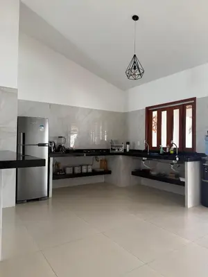A cozinha ou kitchenette de Casa De Praia Morro Branco Holiday Route