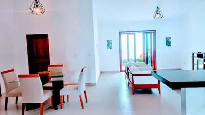 Uma área de estar em Casa De Praia Morro Branco Holiday Route