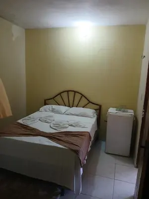Uma cama ou camas num quarto em House das Rosas