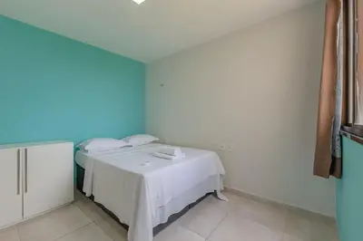 Uma cama ou camas num quarto em Wai Wai #A406 - Resort Pé na Areia By Carpediem