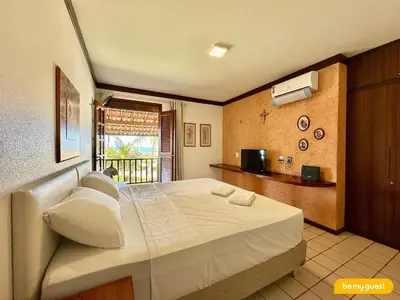 Uma cama ou camas num quarto em Bela Vista Porto das Dunas