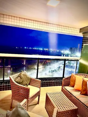 Uma área de estar em Ed Landscape Apt Luxo de 2 quartos Frente Mar