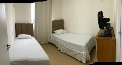 Uma cama ou camas num quarto em Mirante Clube Praia do Futuro