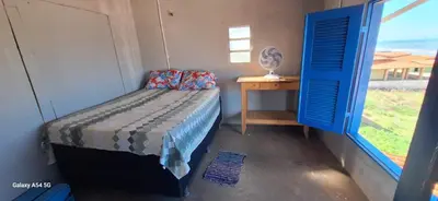 Uma cama ou camas num quarto em Casa Mosaico