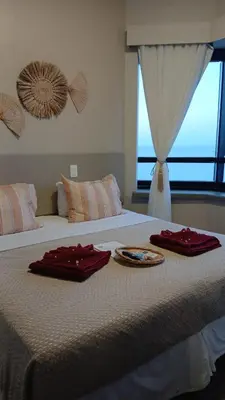 Uma cama ou camas num quarto em DMCeara Golden Fortaleza
