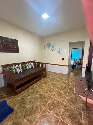 Uma área de estar em Casa Rumaré