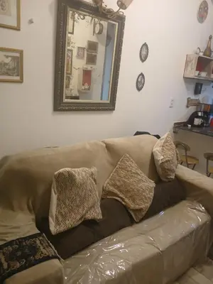 Uma área de estar em Aluguel de 1 quarto aconchegante com ar de nostalgia